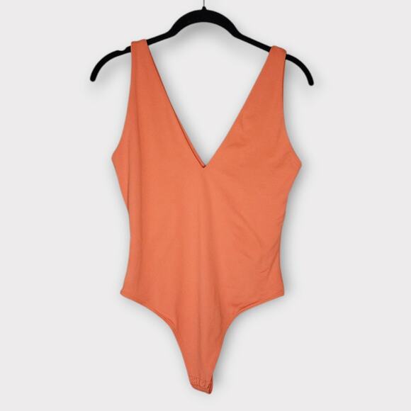 Babaton Womens Deep V-Neck Snap Bodysuit Orange M Modern Minimal Street Chic - Picture 1 of 7
